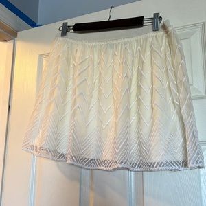 American Eagle cream mini skirt